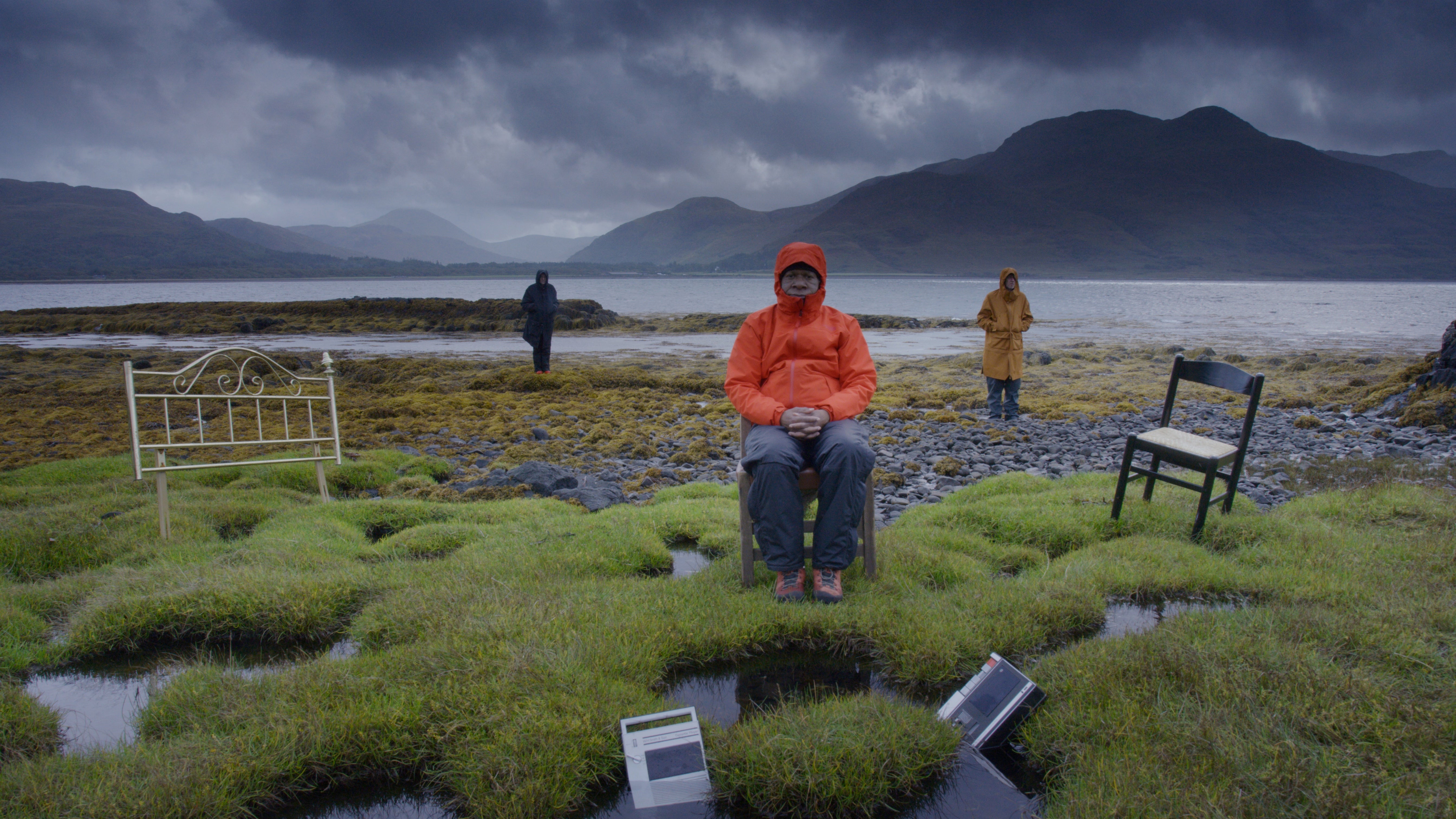 <p>A still from John Akomfrah’s ‘Listening All Night to the Rain’, 2024</p>